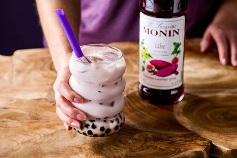 Monin Ube Syrup with iced ube milk tea and tapioca pearls