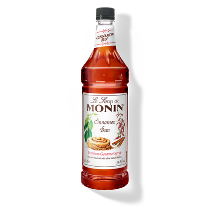 Monin Cinnamon Bun syrup bottle on a white background