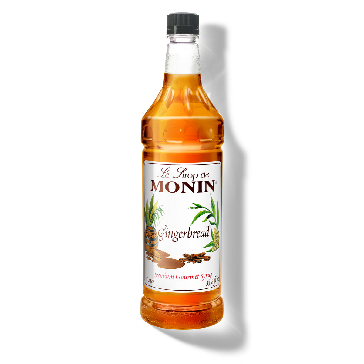A bottle of Monin Gingerbread flavored syrup.