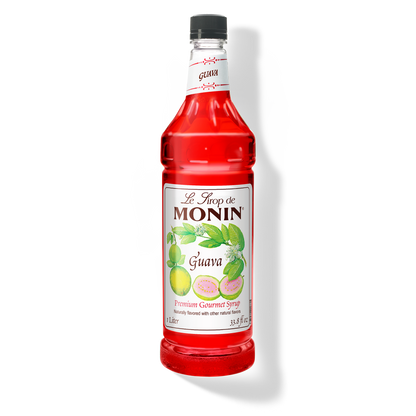 A bottle of Monin Guava Syrup with a label showing the brand name and the flavor, placed against a white background.