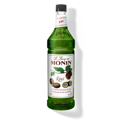 A bottle of Monin Kiwi Syrup with a label showing the brand name and the flavor, placed against a white background.