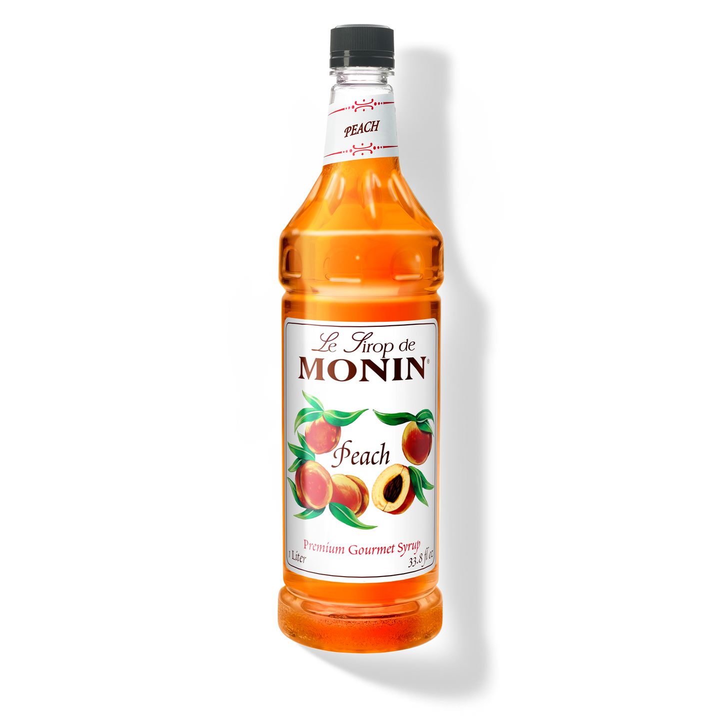 A 1L bottle of Monin Peach Syrup showing the brand name and flavour, placed against a white background
