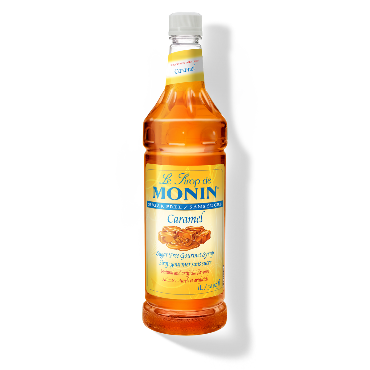 A bottle of Monin Sugar Free Caramel Syrup with a label showing a piece of caramel candy
