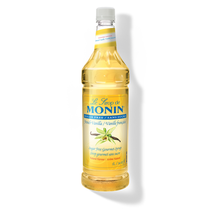 A bottle of Monin Sugar Free French Vanilla Syrup.