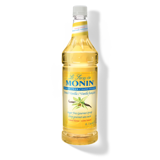 A bottle of Monin Sugar Free French Vanilla Syrup.