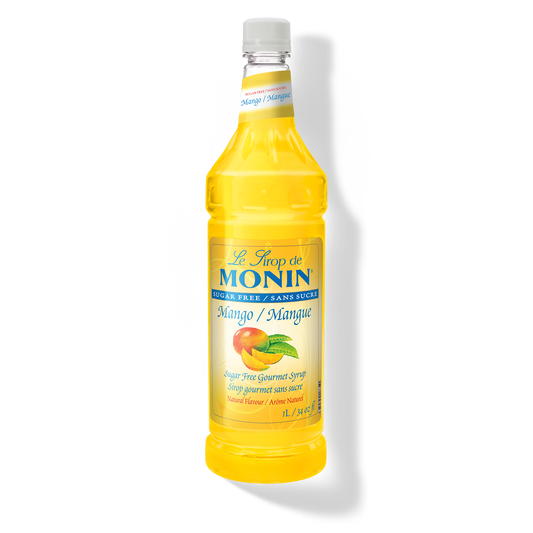 A bottle of Monin Sugar Free Mango Syrup, with a yellow label displaying the product name and mango imagery.