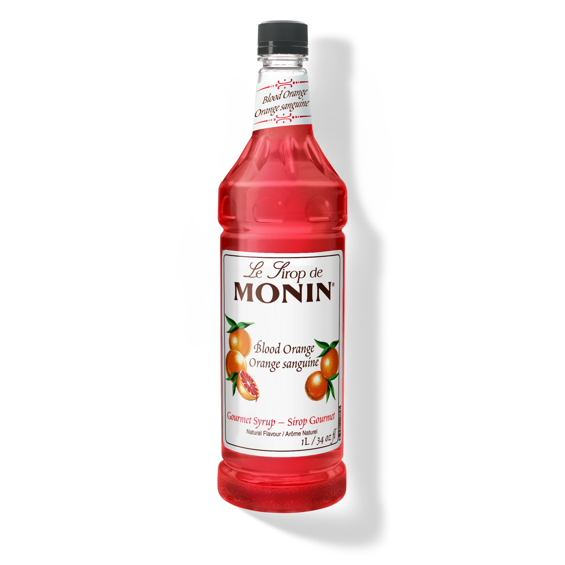 A bottle of Monin Blood Orange Syrup with a label showing an image of a blood orange. The bottle is transparent, showing the bright red syrup inside.