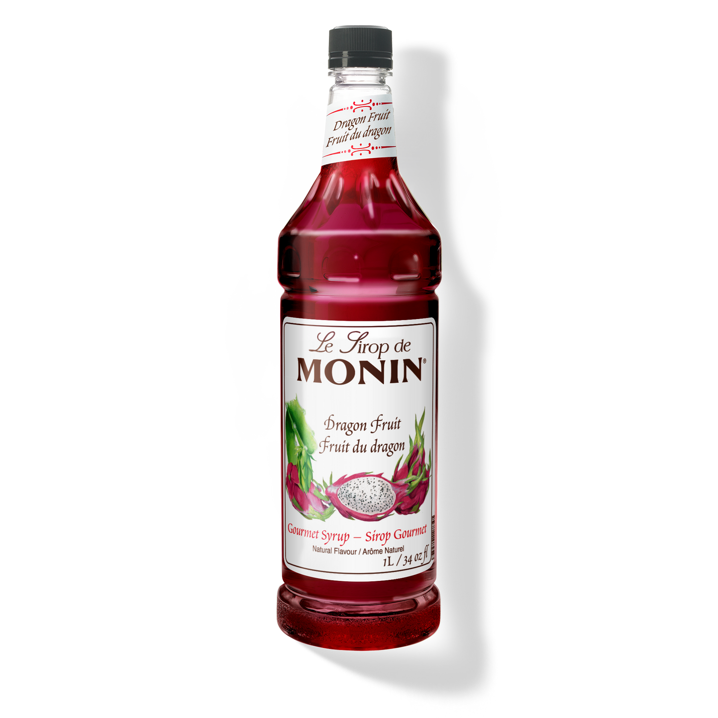 A bottle of Monin Dragon Fruit syrup, featuring a black cap, white label with red dragon fruit illustrations, and a vibrant red liquid inside, set against a plain white background with a soft shadow.
