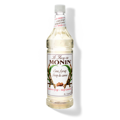 A 1L-bottle of Monin Pure Cane Sugar Syrup with a label showing the brand name and the flavor, placed against a white background.

