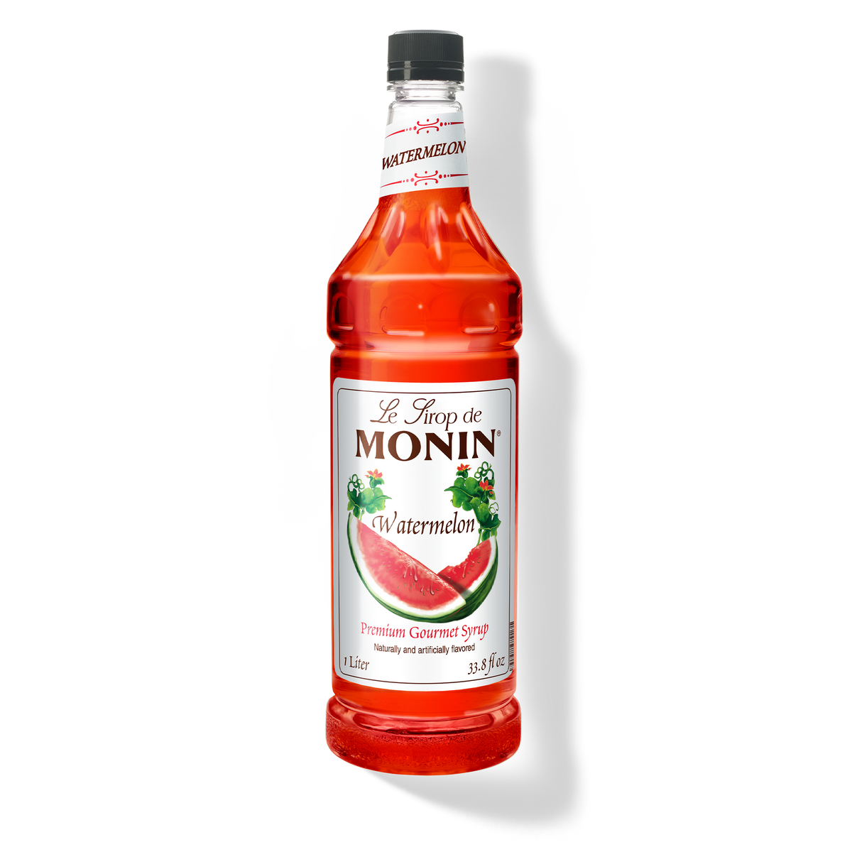 A bottle of Monin Watermelon Syrup with a label showing a watermelon slice, indicating the flavor of the syrup.