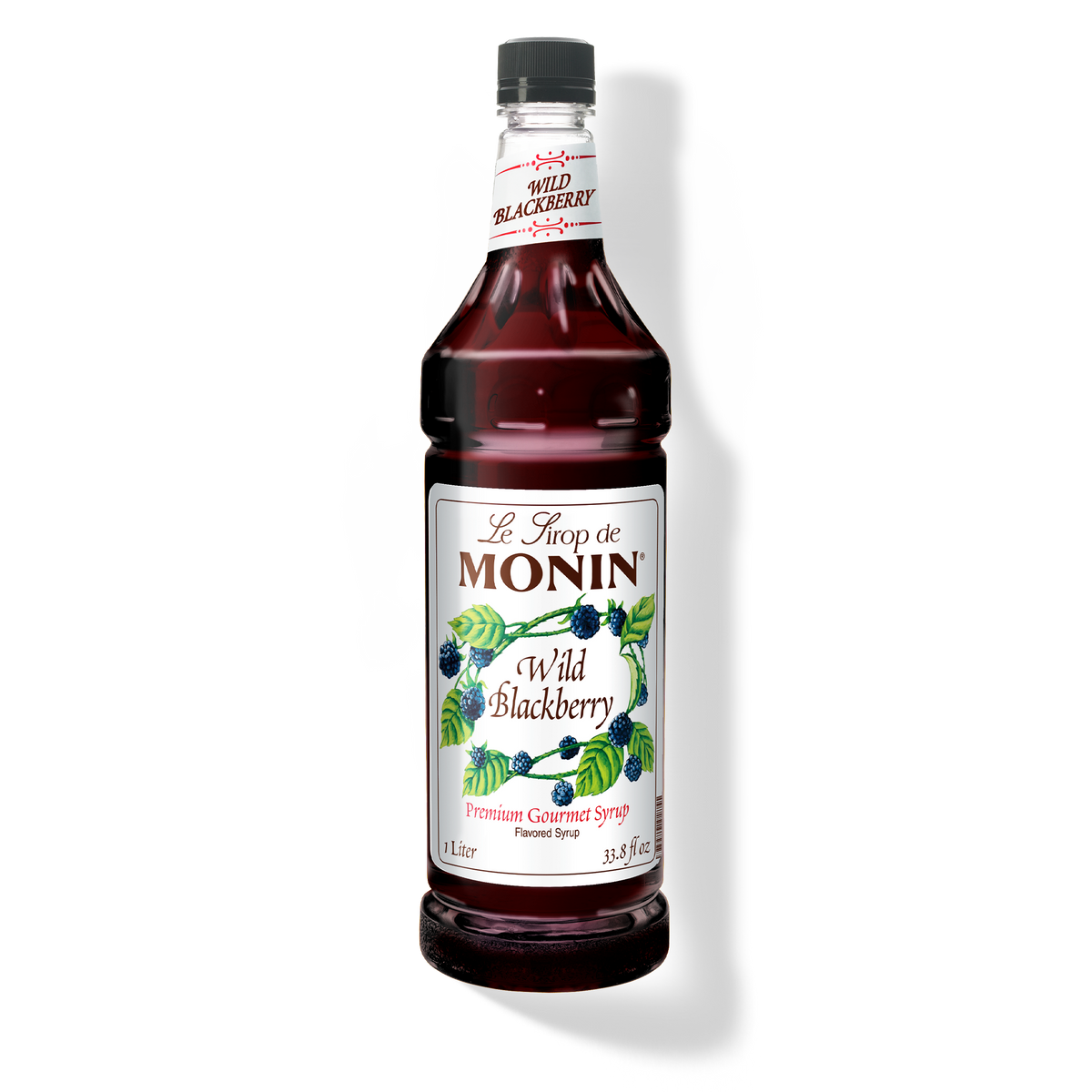 A bottle of Monin Wild Blackberry Syrup with a label showing the product name and a picture of blackberries.