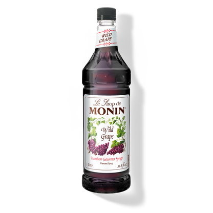Monin Wild Grape Syrup 1 L bottle with dark purple syrup and grape label