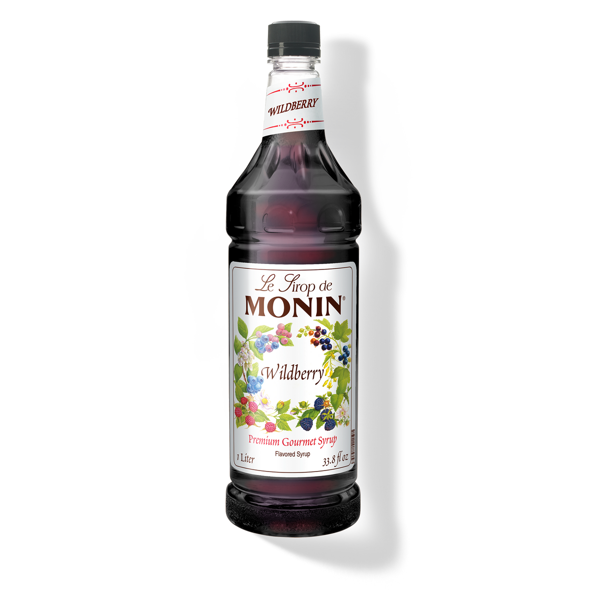 A 1L bottle of Monin Wildberry Syrup with a label featuring the brand name and the flavour.
