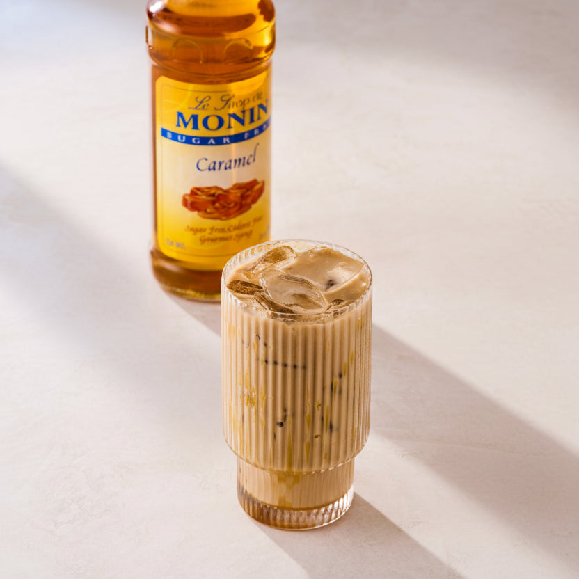 Monin Sugar Free Caramel Syrup with iced caramel coffee