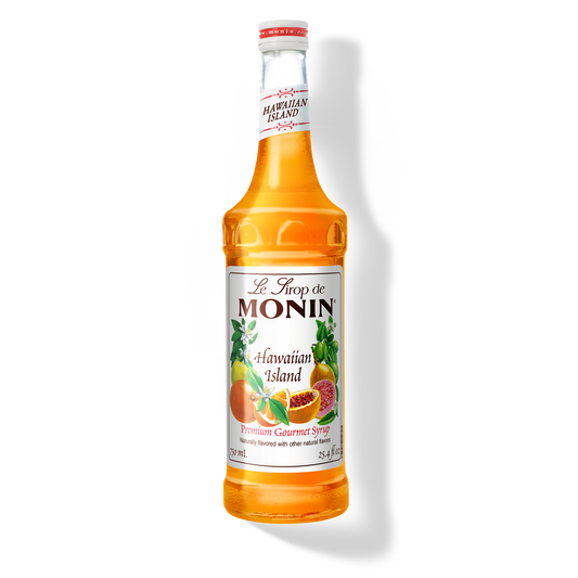A bottle of Monin Hawaiian Island Syrup with a label showing the brand name and the flavor, placed against a white background.