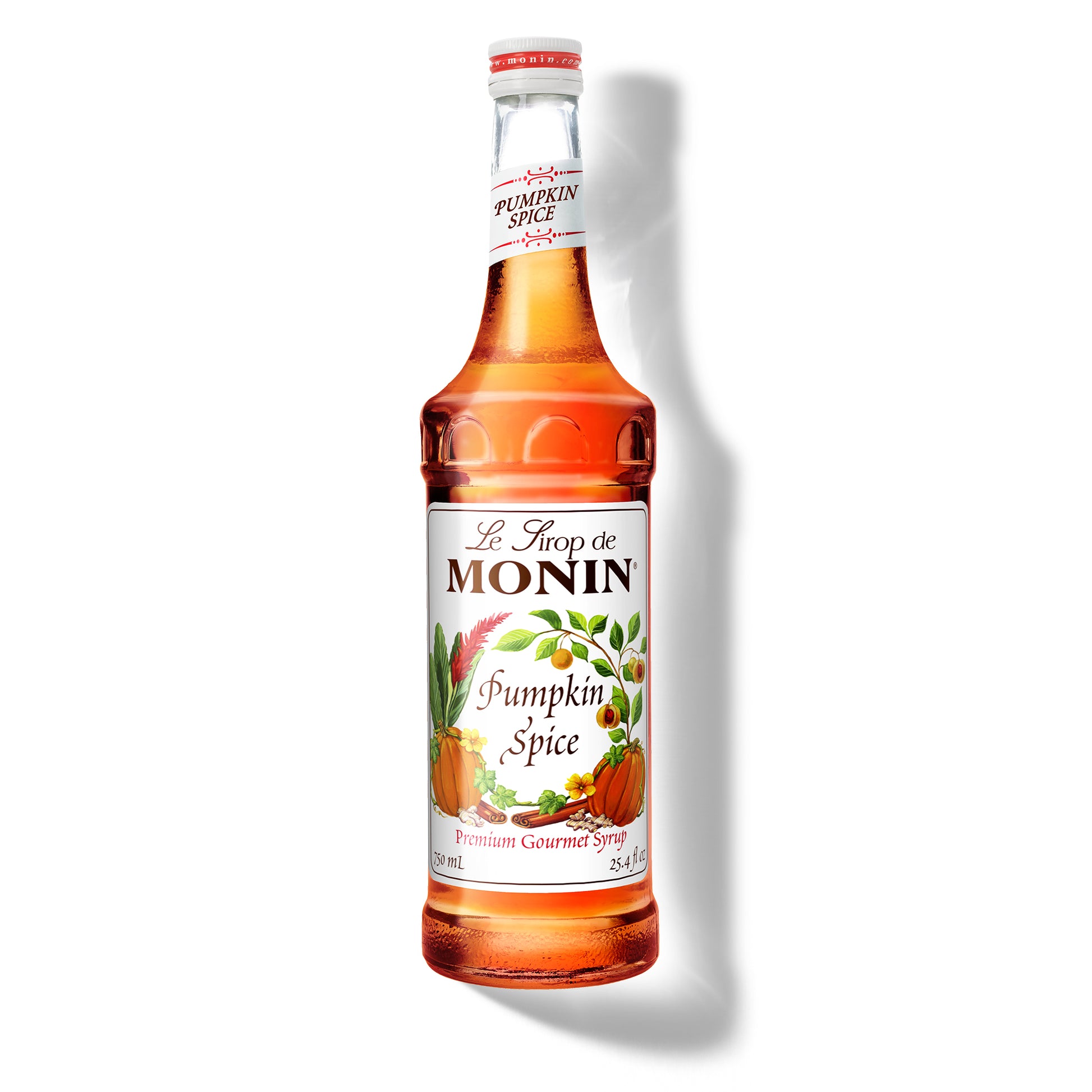 A bottle of Monin Pumpkin Spice Syrup with a label showing the brand name and the flavor, placed against a white background.
