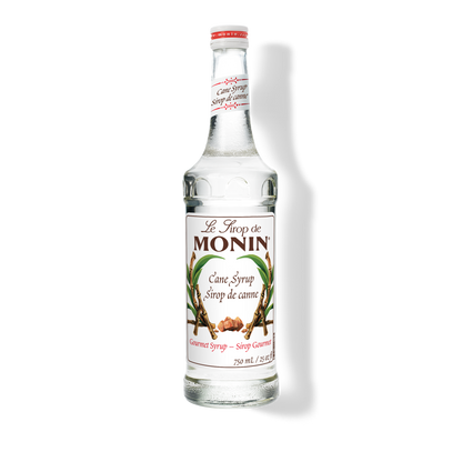 A 750mL-bottle of Monin Pure Cane Sugar Syrup with a label showing the brand name and the flavor, placed against a white background.