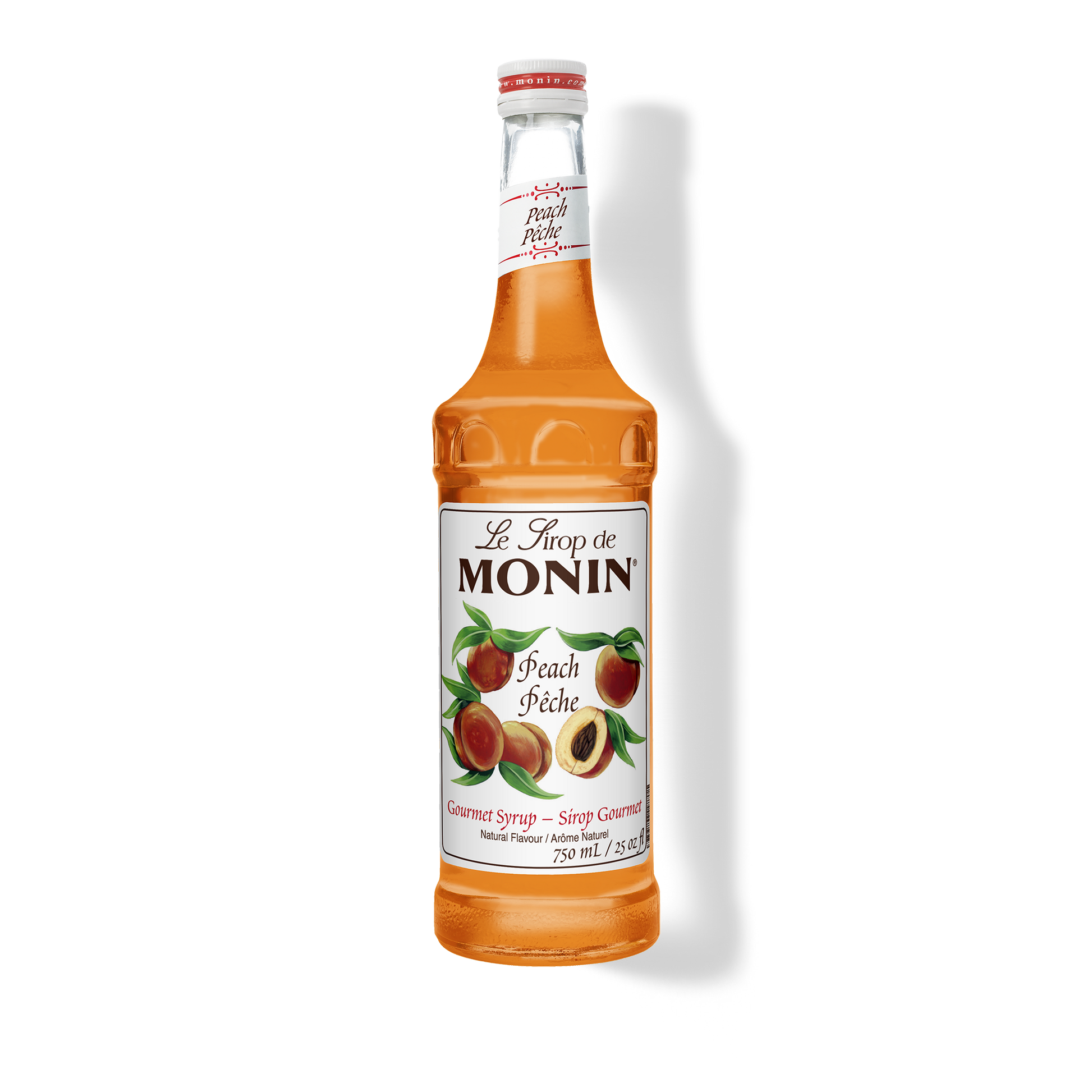 A bottle of Monin Peach (Peche) syrup, filled with orange-amber liquid, on a white background with a soft shadow.