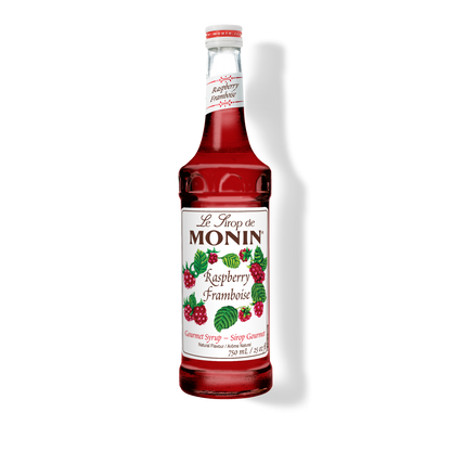 A 750mL-bottle of Monin Raspberry Syrup with a label showing the brand name and the flavor, placed against a white background.