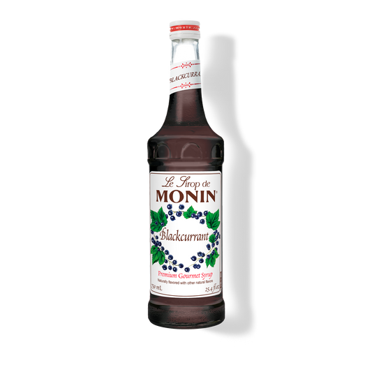 A bottle of Monin Blackcurrant Syrup with a label showing the brand name and the flavor, set against a white background.