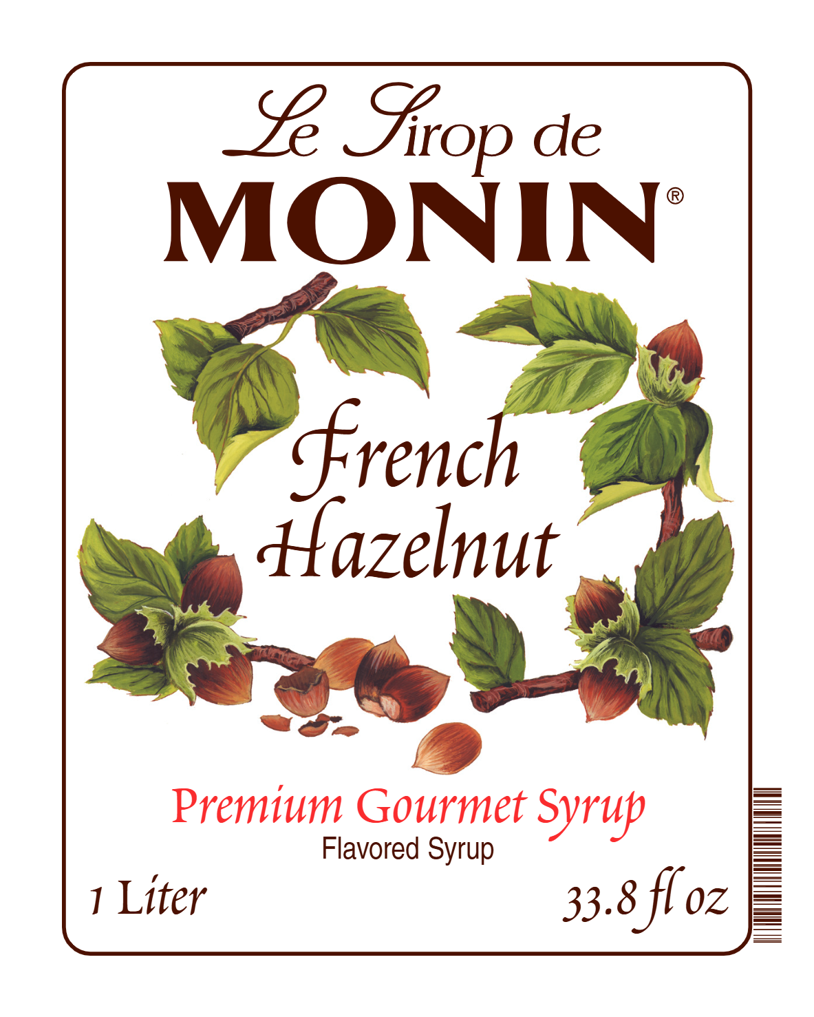 Front label of Monin French Hazelnut Syrup, featuring the brand name and flavour, placed against a white background
