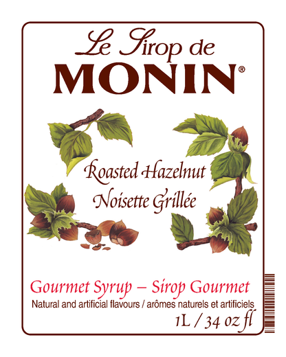 A 1L bottle label of Monin Roasted Hazelnut Syrup (Noisette Grillee), featuring the brand name and flavour, placed against a white background.