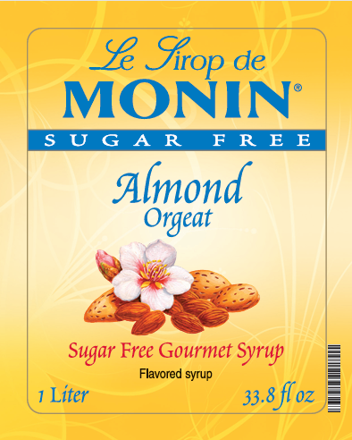 A 1L bottle label of Monin Sugar Free Almond Orgeat, featuring the brand name and flavour, placed against a white background
