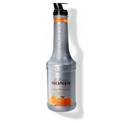 A bottle of Monin Spiced Pumpkin Purée, with a label showing an image of a pumpkin.