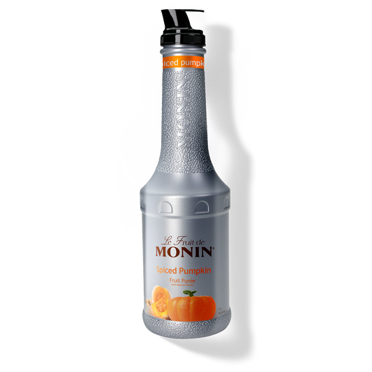 A bottle of Monin Spiced Pumpkin Purée, with a label showing an image of a pumpkin.