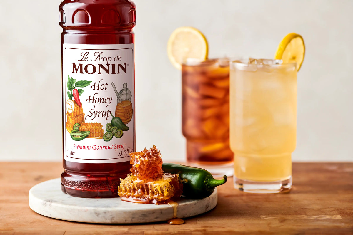 Monin Hot Honey Syrup with honeycomb, jalapeño and two iced drinks