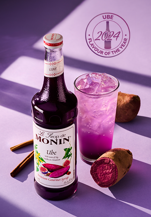 Monin Ube Syrup with purple iced ube drink, fresh ube and cinnamon sticks